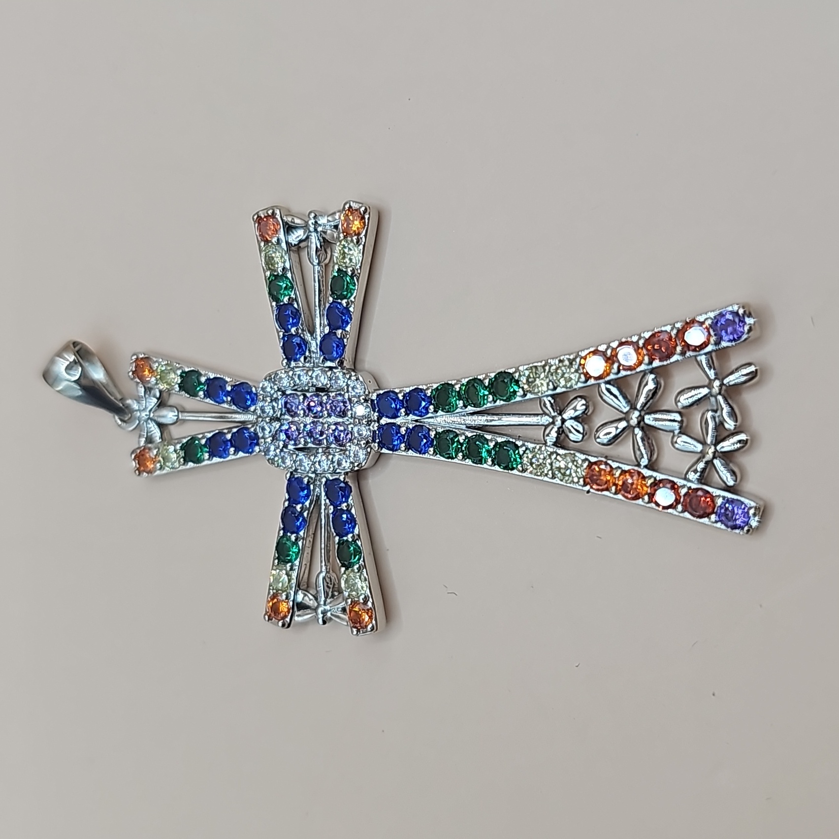 32. Simulated Multi Color Diamond Cross Pendant In Silvertone 4.25 Ctw
